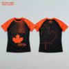 Black and orange Canada-inspired sublimated rash guard with maple leaf design shown in front and back view for BJJ, MMA, and No-Gi training