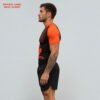 Close-up detail of Canada-inspired sublimated rash guard with black orange fabric design and maple leaf graphics